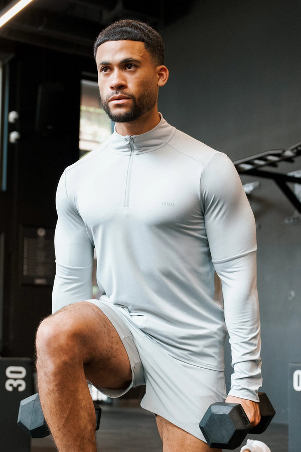 THE ICON ACTIVE HALF ZIP