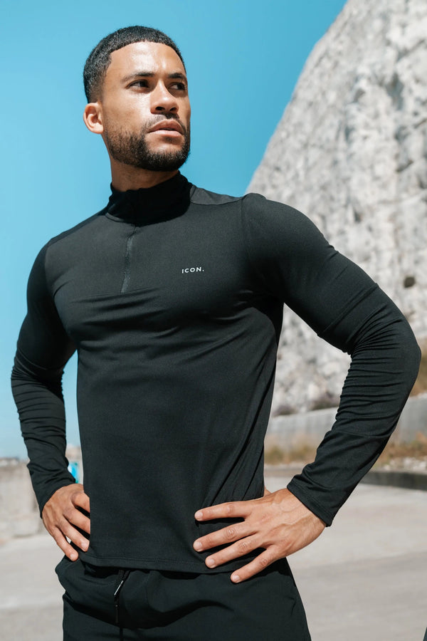 THE ICON ACTIVE HALF ZIP