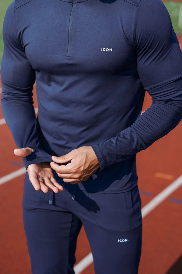 THE ICON ACTIVE HALF ZIP