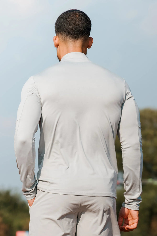 THE ICON ACTIVE HALF ZIP